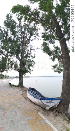 old, wooden boat by the sea old, wooden boat by the sea 79295445