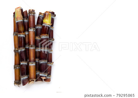 Sugar cane on white background. Sugar cane on white background. 79295865