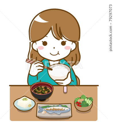 Young woman eating 79297073