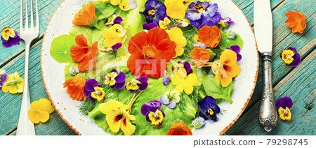 Spring salad with greens and edible flowers 79298745