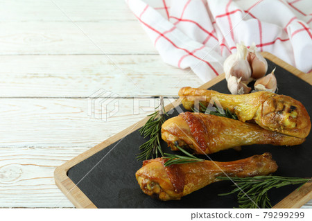 Board with roast chicken drumsticks, space for text Board with roast chicken drumsticks, space for text 79299299
