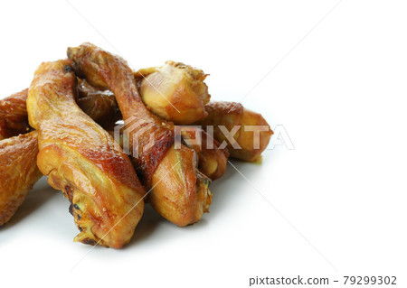 Roast chicken drumsticks isolated on white background Roast chicken drumsticks isolated on white background 79299302
