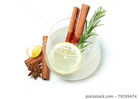 Glass of lemonade with cinnamon and rosemary isolated on white background Glass of lemonade with cinnamon and rosemary isolated on white background 79299474