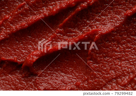 Tasty tomato paste on whole background, close up 79299482