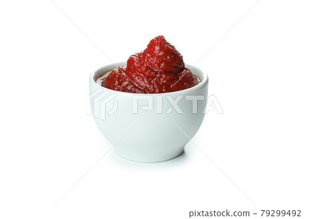 Bowl of tomato paste isolated on white background Bowl of tomato paste isolated on white background 79299492