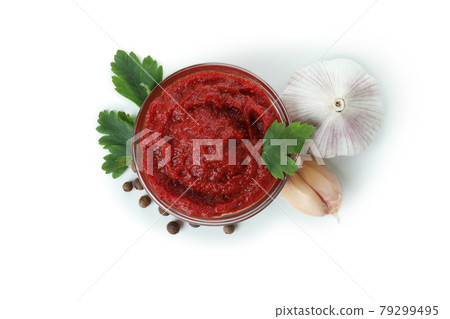 Bowl of tomato paste isolated on white background Bowl of tomato paste isolated on white background 79299495