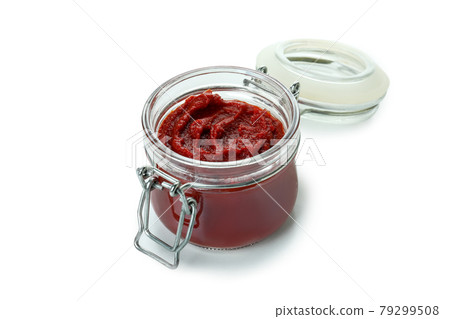 Glass jar of tomato paste isolated on white background 79299508