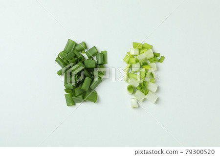 Fresh chopped green onion on white background Fresh chopped green onion on white background 79300520