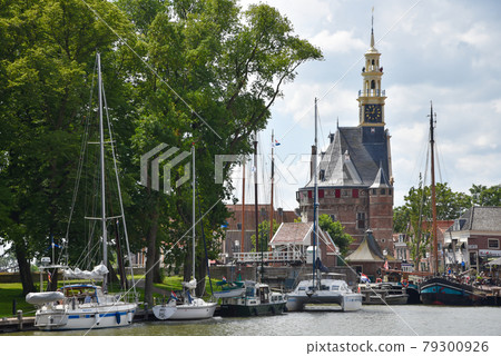 Hoorn, the Netherlands. September 2020. The famous gate of Hoorn, a historical town along the shore of the IJsselmeer, Holland. Hoorn, the Netherlands. September 2020. The famous gate of Hoorn, a historical town along the shore of the IJsselmeer, Holland. 79300926