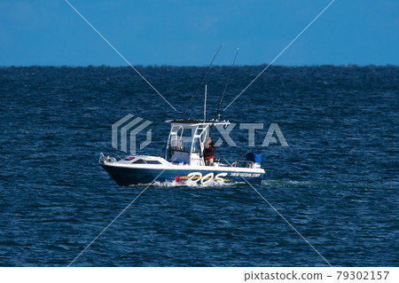 A fishing boat floating in Ise Bay from Marina Kawage A fishing boat floating in Ise Bay from Marina Kawage 79302157