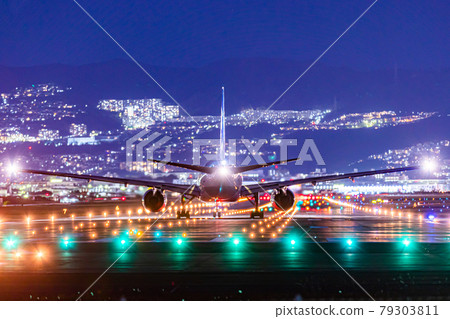 Passenger plane taking off from Osaka Airport 79303811