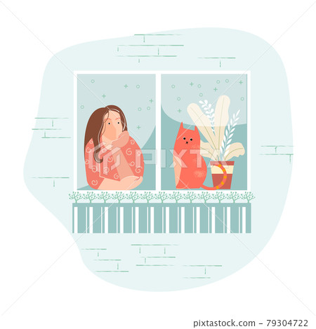 A girl with a cat looks out of the window 79304722