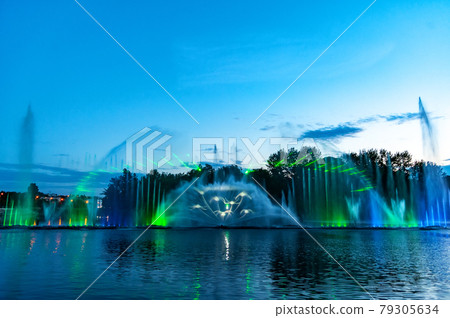 Musical fountain with laser animations. Musical fountain with laser animations. 79305634