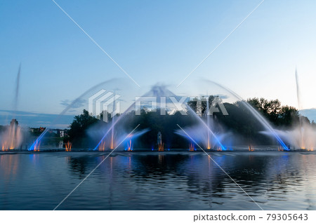 Musical fountain with laser animations. Musical fountain with laser animations. 79305643