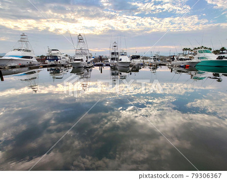 Cloud art and waterside reflection Cloud art and waterside reflection 79306367
