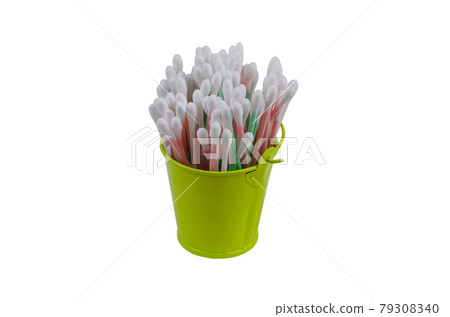 Full green bucket of cotton swabs on a white background. 79308340