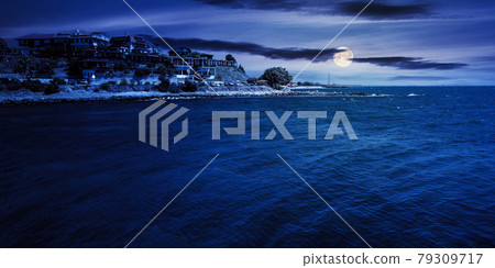 old resort town at night. beautiful scenery at the sea in full moon light old resort town at night. beautiful scenery at the sea in full moon light 79309717