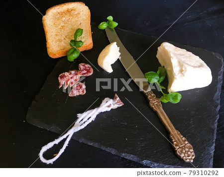 A delicious and hearty classic breakfast. Fresh coffee with mint leaf, young basil leaves and the freshest mozzarella A delicious and hearty classic breakfast. Fresh coffee with mint leaf, young basil leaves and the freshest mozzarella 79310292