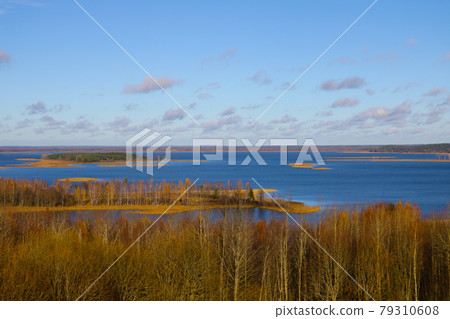 View from the top to a beautiful lake in autumn. 79310608