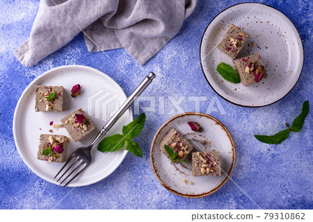 Halva with rose petal and nuts. 79310862