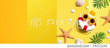 Sunblock bottle wearing sunglasses with starfish and seashells 79311243
