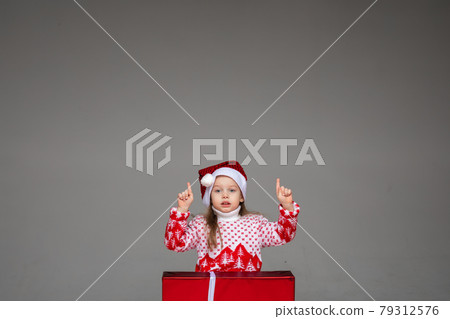Christmas concept photo of a child waiting for Christmas concept photo of a child waiting for 79312576