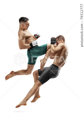 MMA. Knee kick to the head. Two fighters are fighting. Jump kick. Sport action concept. Isolated MMA. Knee kick to the head. Two fighters are fighting. Jump kick. Sport action concept. Isolated 79312777