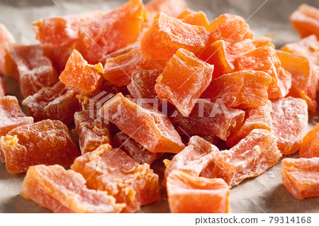 Cooking Natural farm homemade candied pumpkin fruits sprinkled with powdered sugar Cooking Natural farm homemade candied pumpkin fruits sprinkled with powdered sugar 79314168