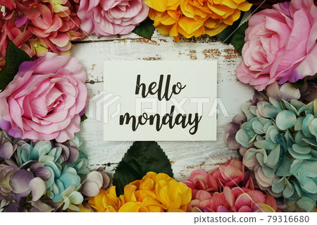 Hello Monday Card with colorful flowers border frame on wooden background Hello Monday Card with colorful flowers border frame on wooden background 79316680