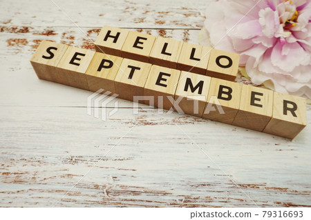 Hello September alphabet letters on wooden background Hello September alphabet letters on wooden background 79316693