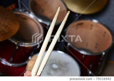 Drummer set drummer with sticks in the background Drummer set drummer with sticks in the background 79316942