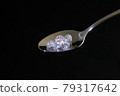 Jewels on a spoon 79317642
