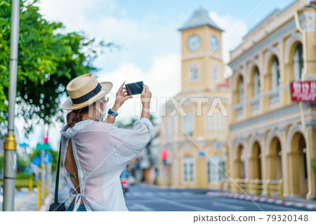 Travelers on street Phuket old town with Building Sino Portuguese architecture at Phuket Old Town area Phuket, Thailand. Travel concept 79320148