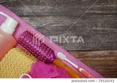 Shower accessories bath items shower gel, sponge, Hair Brush, fibre scrub on wooden background Shower accessories bath items shower gel, sponge, Hair Brush, fibre scrub on wooden background 79320243