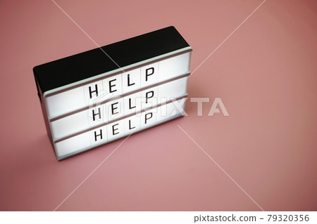 Help word text in light box on pink background Help word text in light box on pink background 79320356