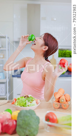 woman enjoy salad food process 79322983