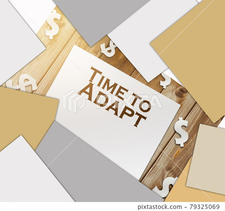 text Time to Adapt page, paper signs of dollar on wood table. Business concept 79325069