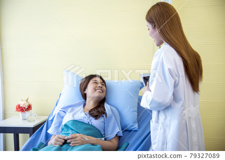 Woman doctor and patient consultation with professional specialist diagnostics at hospital medicare treatment clinic. Doctor writing prescription for medical health care therapy. Woman doctor and patient consultation with professional specialist diagnostics at hospital medicare treatment clinic. Doctor writing prescription for medical health care therapy. 79327089