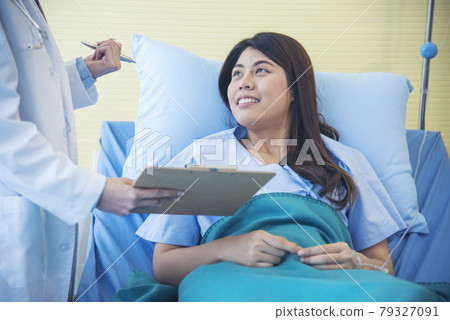 Woman doctor and patient consultation with professional specialist diagnostics at hospital medicare treatment clinic. Doctor writing prescription for medical health care therapy. Woman doctor and patient consultation with professional specialist diagnostics at hospital medicare treatment clinic. Doctor writing prescription for medical health care therapy. 79327091