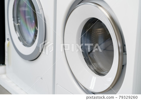 Close up of new dryer machine in household appliances store 79329260