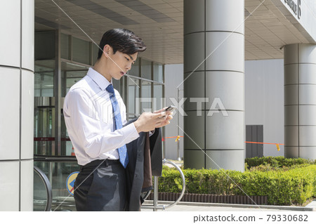 young Asian handsome man checking job interview result young Asian handsome man checking job interview result 79330682