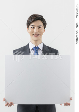 happy Asian man with copyspace banner 79330689