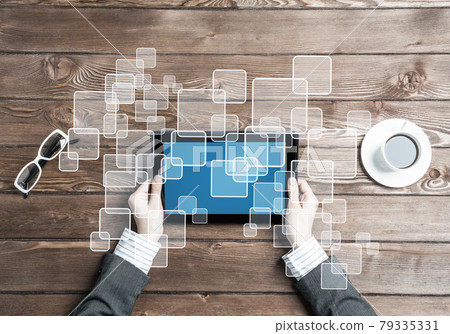 Business workplace with tablet device coffee cup and media user interface Business workplace with tablet device coffee cup and media user interface 79335331