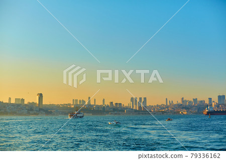 the ship sails at sunset on the Bosphorus Strait in Istanbul the ship sails at sunset on the Bosphorus Strait in Istanbul 79336162