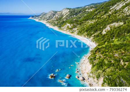 Aerial view of Lefkada coastline. Beautiful beaches, mountains, cypress and pine tree vegetation. Ionian Sea, Greece. 79336274