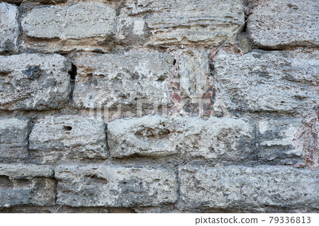 Old stone bricks wall texture close up 79336813
