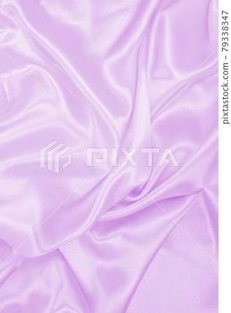 Smooth elegant lilac silk or satin texture as wedding background. Luxurious background design 79338347