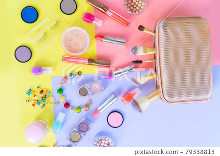 Colorful make up flat lay scene 79338813