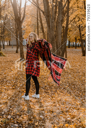 Get Ready for Fall. Prepare yourself for the Fall autumn season. No stress, reduce fall depression, positive emotions. Happy young woman enjoying life in autumn park. Get Ready for Fall. Prepare yourself for the Fall autumn season. No stress, reduce fall depression, positive emotions. Happy young woman enjoying life in autumn park. 79339628