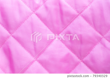 Pink color of cloth with diamond shape texture background Pink color of cloth with diamond shape texture background 79340329